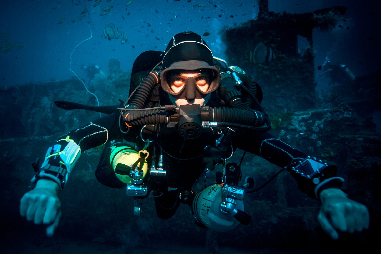 Underwater portrait of technical diver using a rebreather device to locate shipwreck, Lombok, Indonesia Underwater portrait of technical diver using a rebreather device to locate shipwreck, Lombok, Indonesia